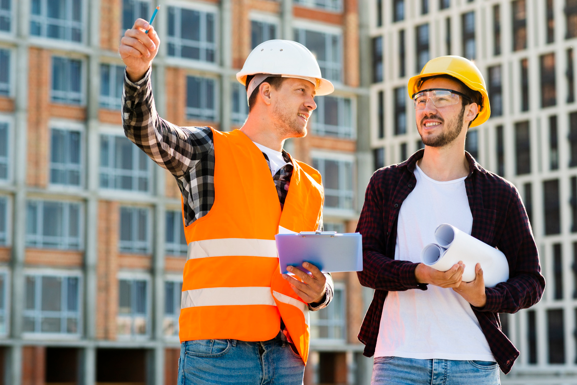 Engineers visiting a work place and talking